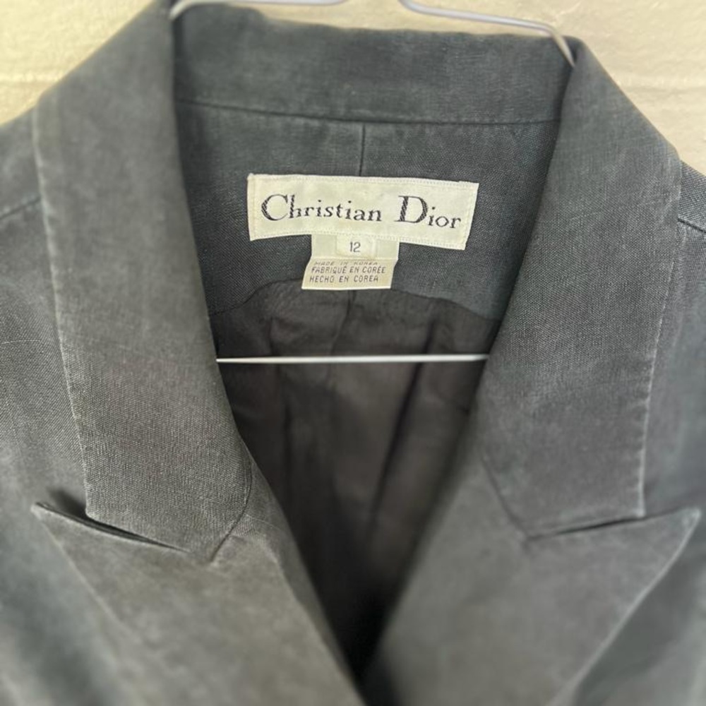 Christian Dior | Vintage Sleeveless Black Vest
With gold buttons